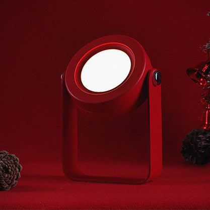 Red portable light on a red background