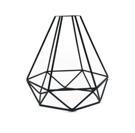 Geometric black metal wall art on a white background