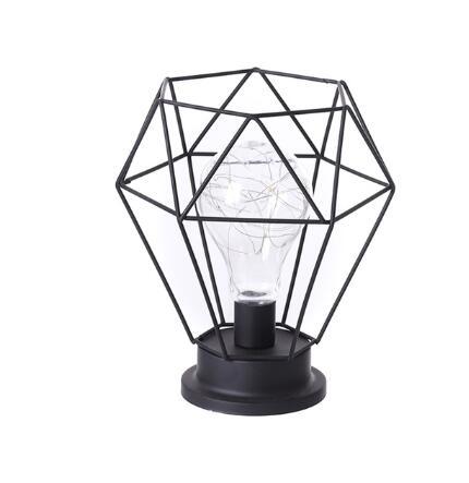 Geometric black metal lamp with a clear bulb on a white background