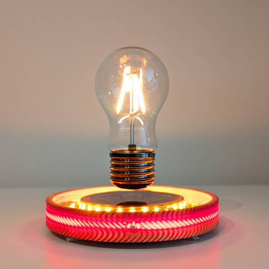 Levitating Vintage Filament Light Bulb Floating Above Glowing LED Base