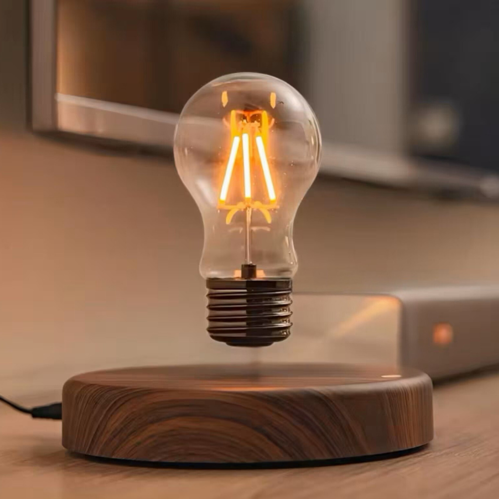 Light bulb on a wooden base with a blurred background